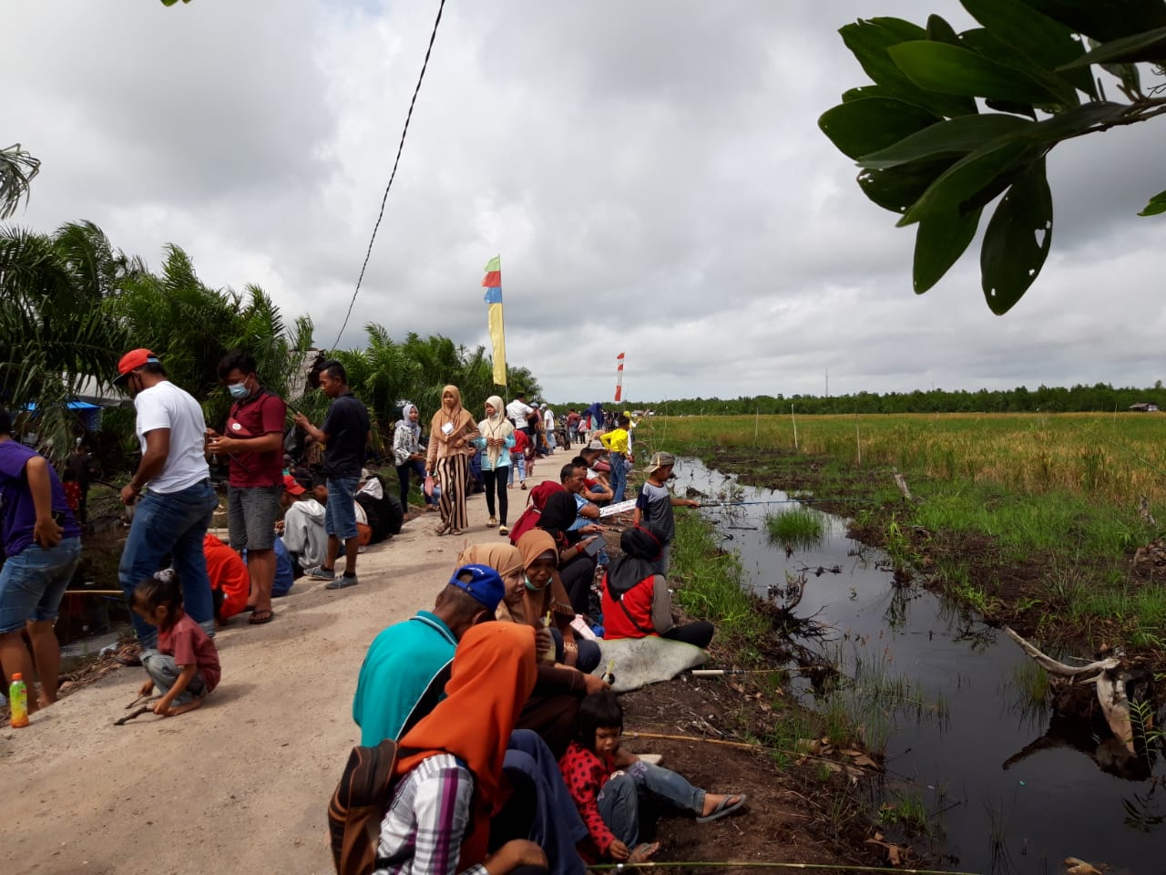 Lomba Mancing Ikan Puyu Wadah Mengenalkan Agrowisata Desa Berancah